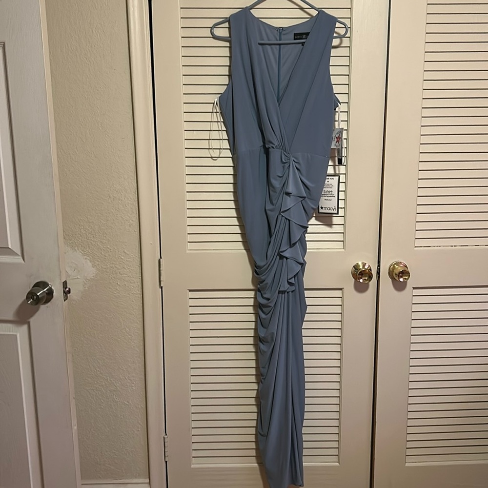 Blue maxi gown, size 14, brand new. Brand name is Betsy and Adam.